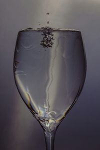 Close-up of drink over white background