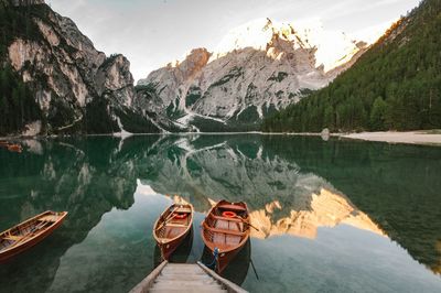 Scenic view of lake by rocky mountains