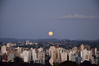 High angle view of buildings against sky at dusk