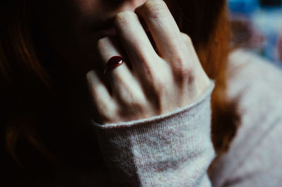 Close-up of woman wearing ring