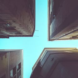 Low angle view of building against blue sky