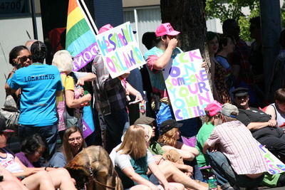 Rear view of people sitting on stage