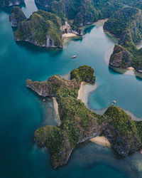 High angle view of rocks by sea