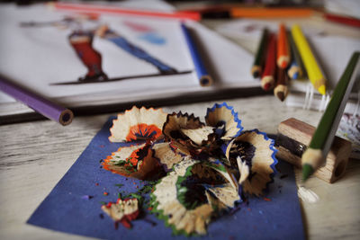 High angle view of multi colored pencils on table