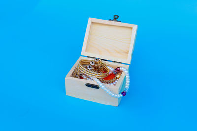 High angle view of a box on blue background