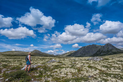 Female wander in landscape at peer gynt hytta, rondane nationalpark, høvringen
