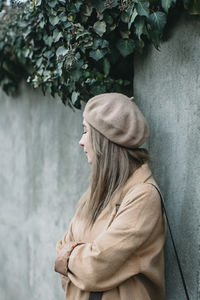 Rear view of woman standing outdoors