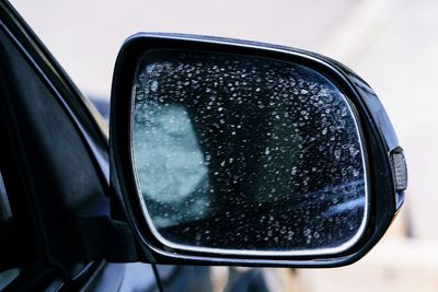 Dirty on car side mirror 