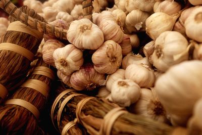 Close-up of garlics in basket