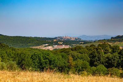 Scenic view of townscape against sky