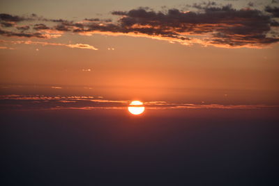 Scenic view of silhouette landscape against romantic sky at sunset