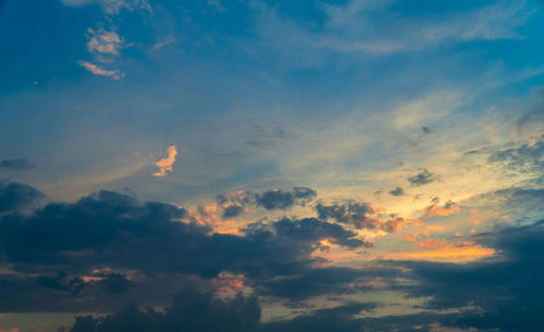 Low angle view of clouds in sky during sunset