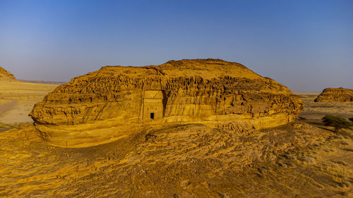 Saudi arabia, medina province, al ula, aerial view of ancient tomb in mada’in salih