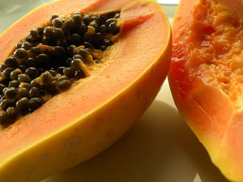 High angle view of fruits in plate on table
