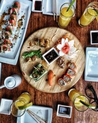 High angle view of food served on wooden table