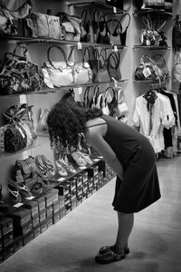 Woman standing at market stall