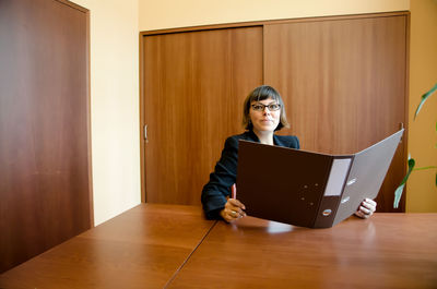 Young businesswoman in office