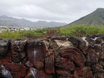 Scenic view of rocks against sky