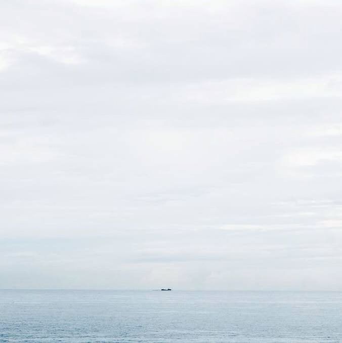 sea, horizon over water, water, waterfront, sky, tranquil scene, scenics, tranquility, beauty in nature, nature, seascape, cloud - sky, idyllic, cloudy, cloud, outdoors, day, ocean, calm, nautical vessel