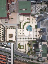 High angle view of road by buildings in city