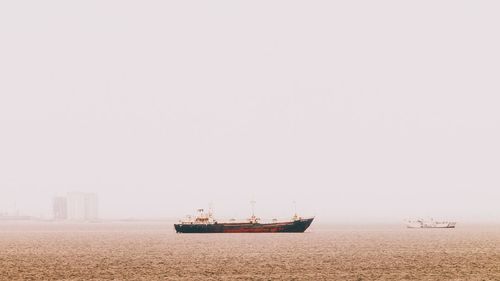 Boat sailing in sea