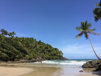 Scenic view of sea against clear blue sky