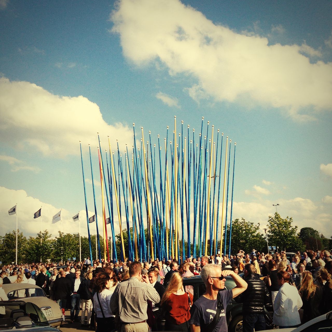 large group of people, sky, crowd, lifestyles, person, men, leisure activity, cloud - sky, cloudy, enjoyment, arts culture and entertainment, mixed age range, cloud, togetherness, panoramic, standing, outdoors, spectator