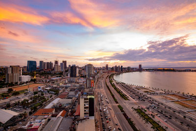 High angle view of cityscape against sky during sunset