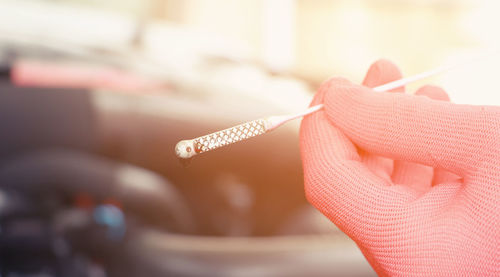 Close-up of woman holding hand