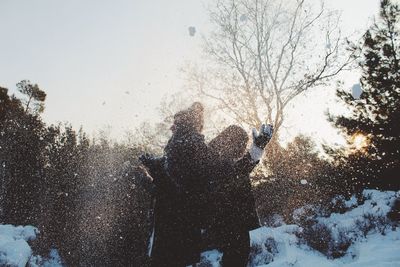 People playing in the snow