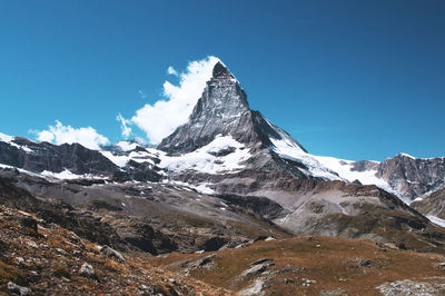 Low angle view of mountains against sky