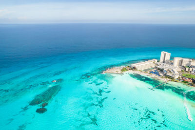 High angle view of swimming pool by sea against sky