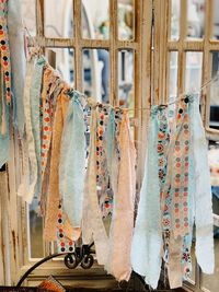 Close-up of clothes drying for sale in market