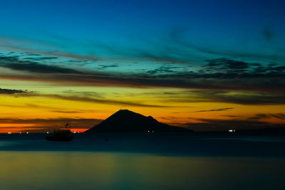 Scenic view of mountains at sunset