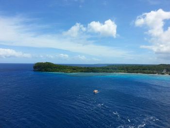 Scenic view of sea against cloudy sky