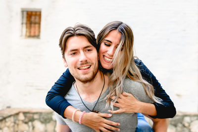 Portrait of a smiling young couple