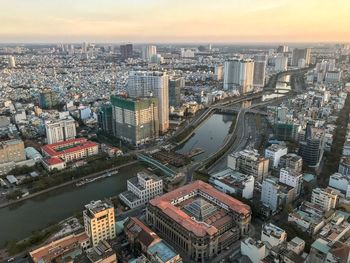 High angle view of city buildings against sky