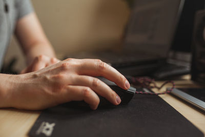 Midsection of person working on table