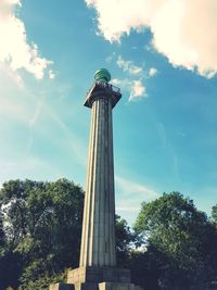 Low angle view of statue against cloudy sky