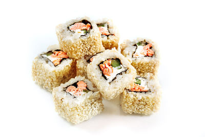 High angle view of sushi against white background
