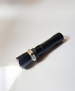 High angle view of pen on table against white background