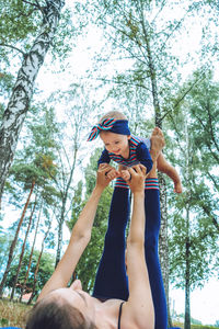 Mom and baby yoga outdoor classes. wellness, family yoga class, practicing mindfulness and