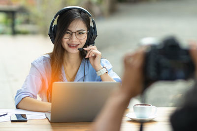 Young woman using mobile phone