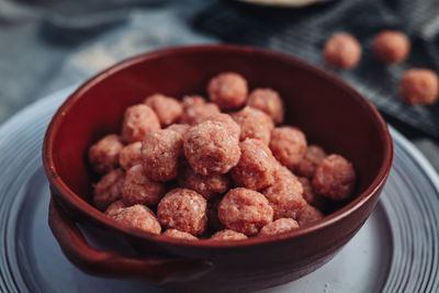 Close-up of raspberries in bowl on table