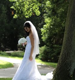 High angle view of woman standing against white tree