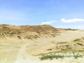 Scenic view of desert against sky