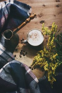 High angle view of coffee cup on table