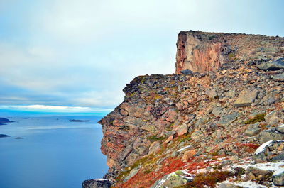 Several faces made by nature are visible in this rock