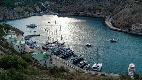 High angle view of boats in city