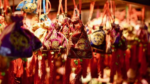 Close-up of decorations for sale at market stall